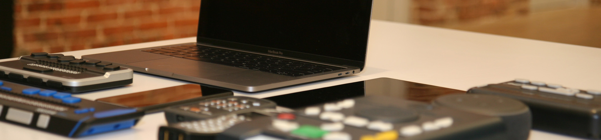 A number of accessible devices on a table.